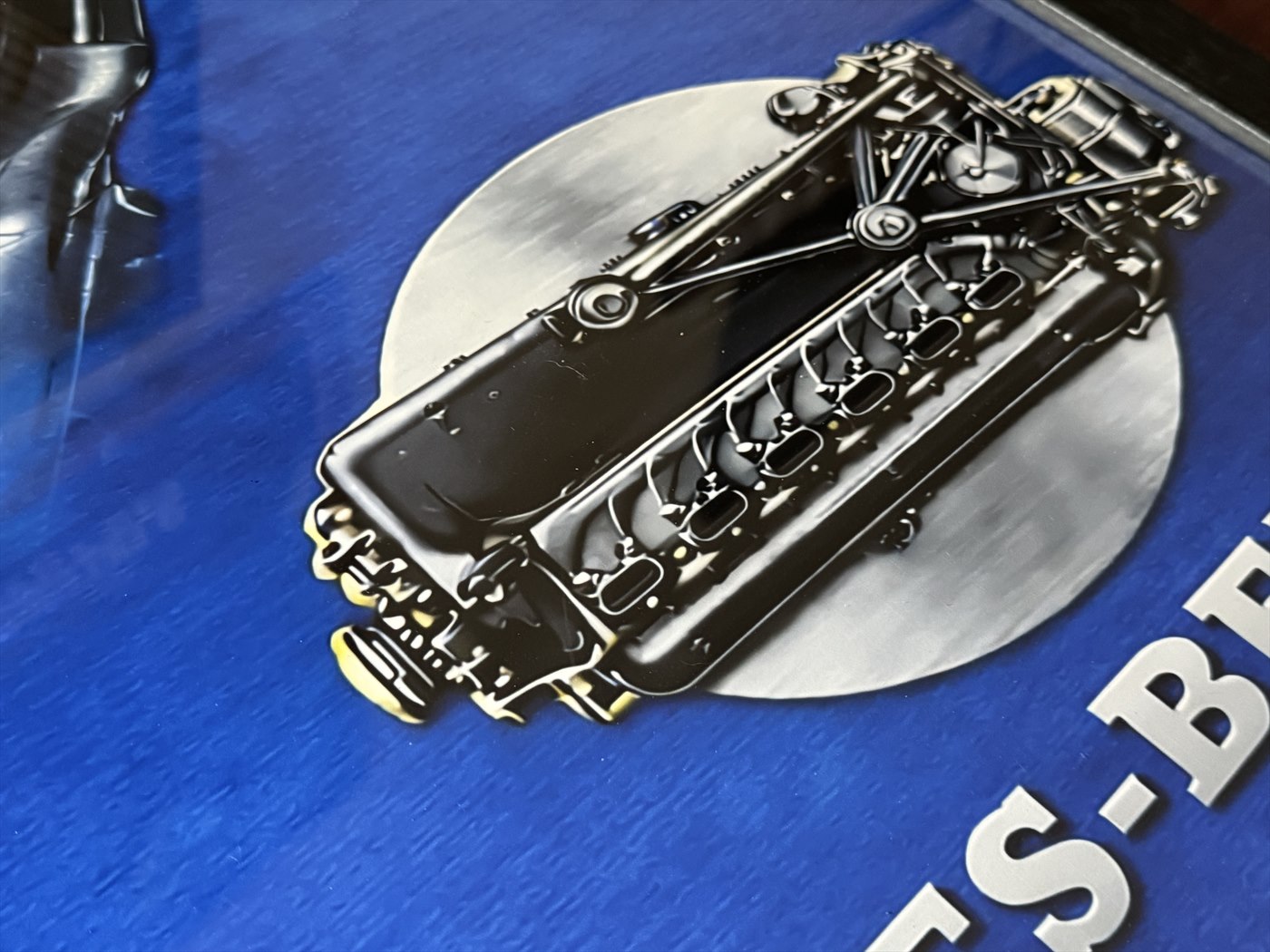 Real BF109 Blue Steel print photographed under angled light, showing the engine detail and cobalt matte field
