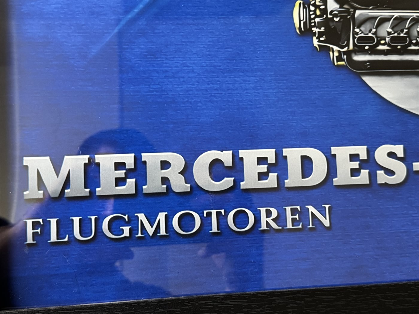 Real BF109 Blue Steel print close-up showing raised-looking metallic typography and matte blue surface